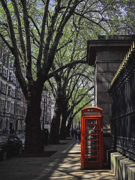 Red telephone booth on London street