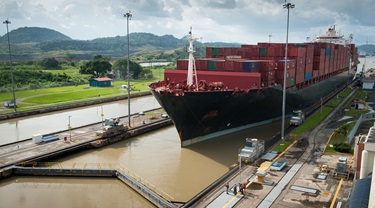 Container ship travelling through the Panama Chanel