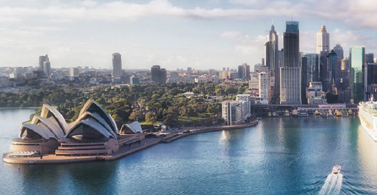 Downtown Sydney’s harbour abuzz with activity and commerce.