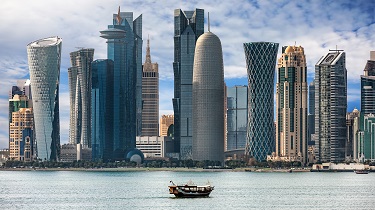 Dramatic cityscape from bay of Doha, Qatar