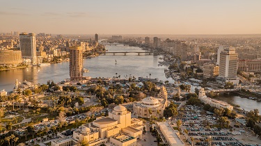 Aerial view of Cairo, Egypt with the Nile River flowing through the centre.