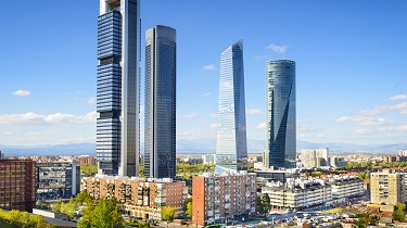 Modern skyscrapers rise up in Madrid’s financial district.