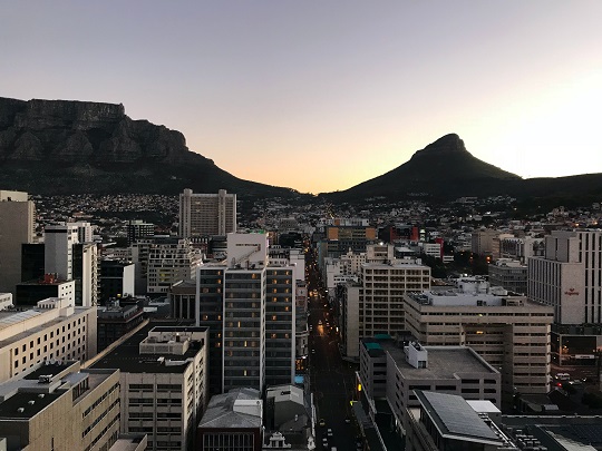 Sun sets over Cape Town cityscape