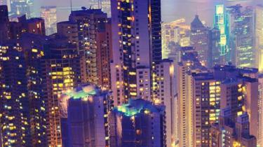 City skyscrapers at night can be hard to define, just like your international market strategy.