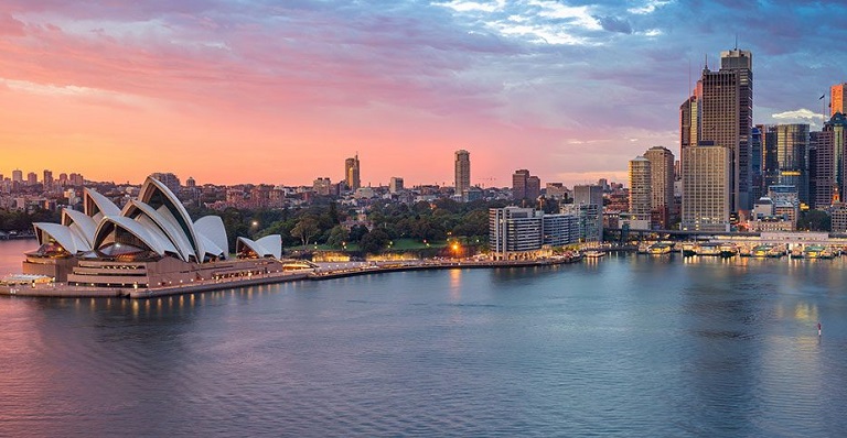 Downtown Sydney’s harbour abuzz with activity and commerce.