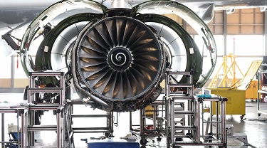  Aircraft jet engine maintenance in airport hangar 