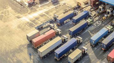 Transport trucks lined up at the border ready to take Canadian exports to the U.S. market.