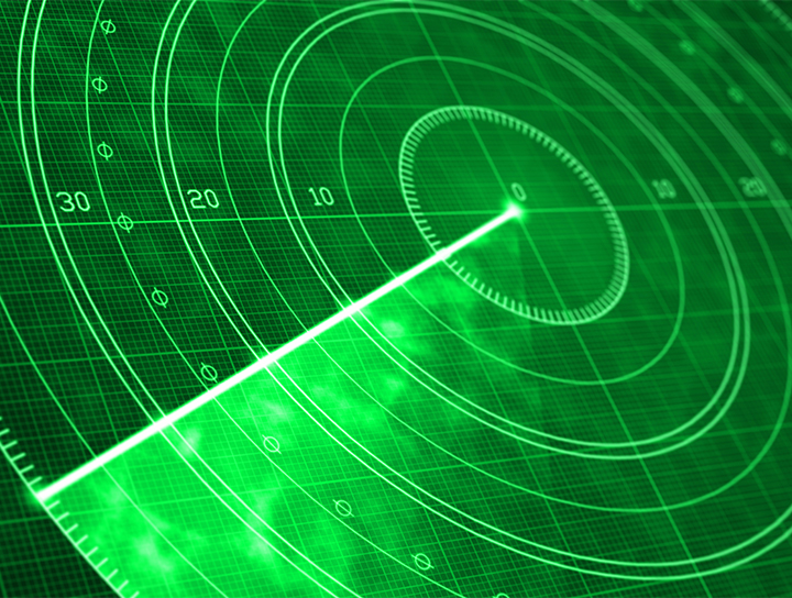 Écran radar vert avec ligne de balayage et grille circulaire.