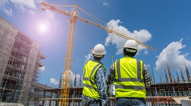 Civil engineers discuss work on U.S. job site