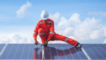 Technicians working on solar panels