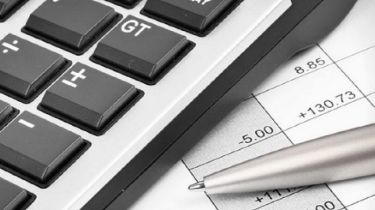 Woman works at a laptop