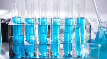 Tornado Spectral Systems manufactures chemical analysis and measurement products. Photo features science test tubes.