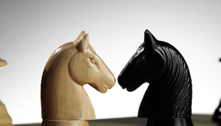 Chess pieces demonstrate there are many players when you're a business person selling internationally.