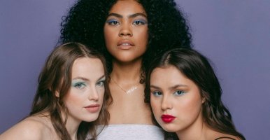 Three women of different skin types model Cheekbone Beauty cosmetics.