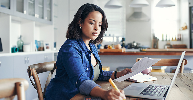 Business woman researching a potential international business partner