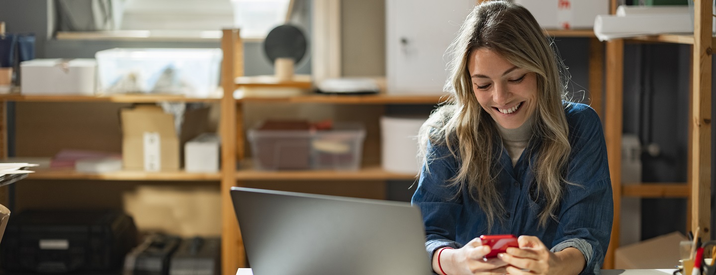 Young female entrepreneur taking stock of her inventory