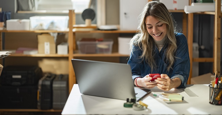 Young female entrepreneur taking stock of her inventory