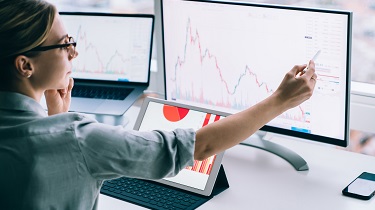 Businesswoman works on a financial forecast.