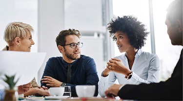 Business people discussing at a table