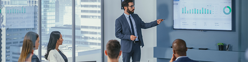 An expert outlining the risk tolerance and FX risk management policy of a company