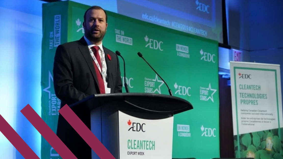 Bearded man at Cleantech podium