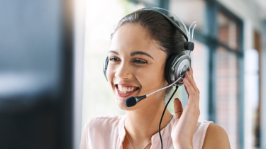 Smiling woman with headset