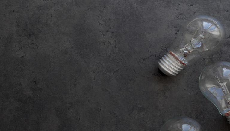 White lightbulb as a metaphor for ideas as intellectual property assets and the need to protect ideas