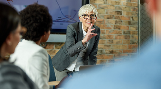 People discussing in a board room