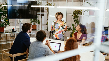 Image of sustainability team discussing issues