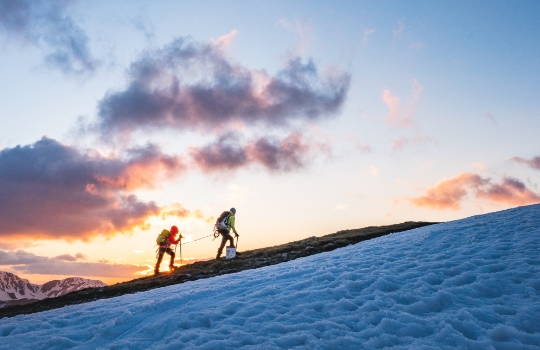 Hikers explore mountain landscape