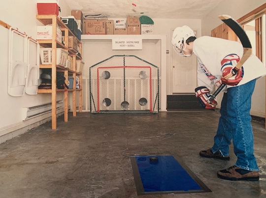 J-P Brun shooting pucks in his garage with the SkillMaster Shooting Range