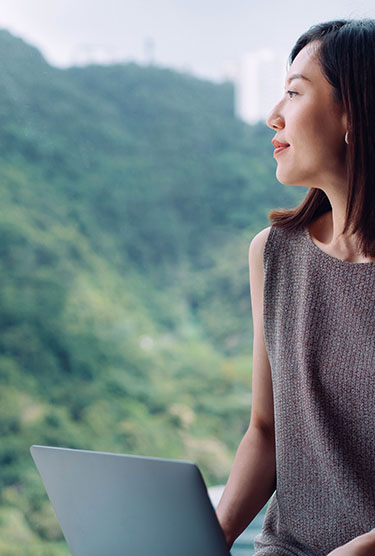 Woman looking out of window