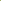 Racing car with blurred green trees on either side.