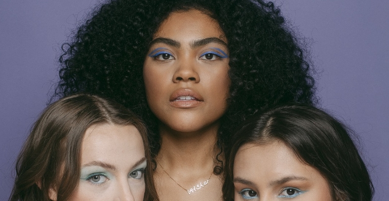 Three women of different skin types model Cheekbone Beauty cosmetics.