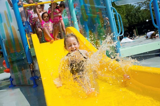 Children playing at water park