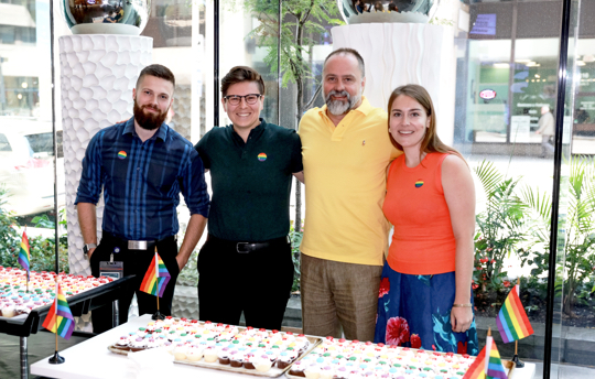 EDC employees participate in a Pride event as part of the Diversity and Inclusion Committee