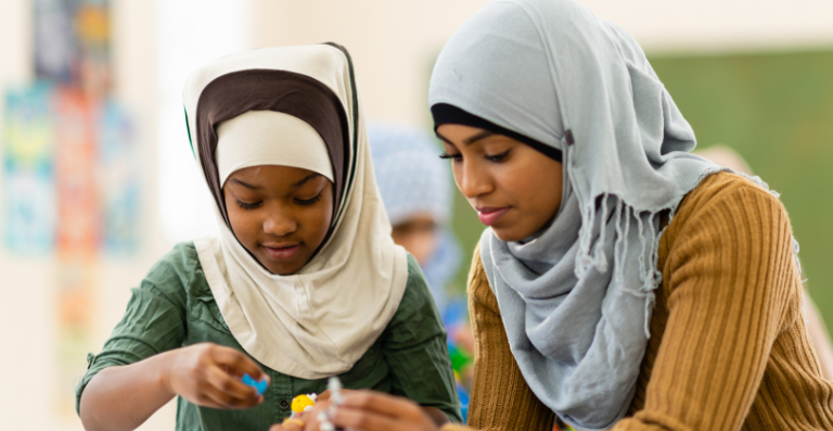 Woman and girl in hijabs