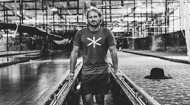 Jordan Kendel of Ekumenik stands in a Bali factory where his menswear line is made