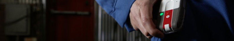 A hand holding a GPS device, a globally innovative tool